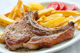 Chuleta con papas fritas